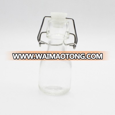 Clear swing top glass bottle with stopper wholesale